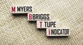 MBTI - word written on wooden blocks. text is written in black letters