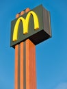 Mc donald signpost logo clear sky perspective view Royalty Free Stock Photo