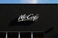 McCafe sign on the black background. Close up shot.
