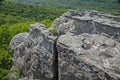 Massive rocks and green mountains create a stunning view on McCloud Mountain.