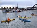 McCovey Cove fill with kayaks, boats, and people outside AT&T Park
