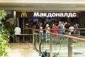 A McDonald`s fast food restaurant in a mall with people queuing up. Moscow, Russia, 07-21-2021