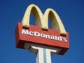 McDonald`s sign with neon golden arches