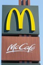 McDonalds Logo sign McDonald`s McCafe Cafe Restaurant Mc Donald`s Mc Donalds portrait format Stuttgart Royalty Free Stock Photo