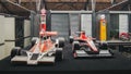 1978 McLaren M26 F1 James Hunt and 2013 F1 Marussia MR02 Max Chilton, Jules Bianchi Royalty Free Stock Photo