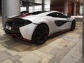 Mclaren 570S - super performance car in white and black with red lines