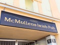 Mcmullens irish pub sign on building exterior Royalty Free Stock Photo