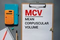 MCV - Mean Corpuscular Volume acronym, concept background. Royalty Free Stock Photo