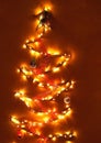 Mde shinny christmas tree with lights Royalty Free Stock Photo