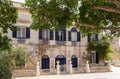 Picturesque house in Mdina, Malta, with navy blue door and windows shutters Royalty Free Stock Photo