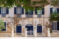 Picturesque house in Mdina, Malta, with navy blue door and windows shutters Royalty Free Stock Photo