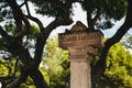 MDINA, MALTA - SEPTEMBER, 15 2018: Weathered stone sign post in Howard Gardens surrounded by old trees, Rabat, Mdina, Malta
