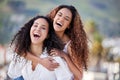 Me and my bestie, livin young, wild and free. two young women enjoying a piggyback ride outdoors. Royalty Free Stock Photo