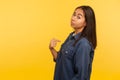 This is me! Portrait of arrogant selfish girl in denim shirt proudly pointing herself, boasting of success, feeling supercilious Royalty Free Stock Photo