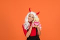 This is for me. teen girl ready to celebrate costume party. funny red imp horns. happy halloween. smiling child in devil Royalty Free Stock Photo