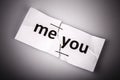 me you words written on torn and stapled paper Royalty Free Stock Photo