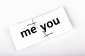 Me you words written on torn and stapled paper on white Royalty Free Stock Photo