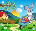 Meadow with bunny and wheelbarrow