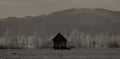 Meadow and chalets against the background of the mountains. Royalty Free Stock Photo