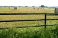 Meadow grasslands farm round bales in Texas