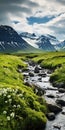 Stunning Hd Landscape: Stream And Mountain With Green Flowering Grass Royalty Free Stock Photo