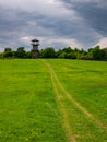 Meadow path leads to Erbenova vyhlidka - The Erben`s lookout tower on the horizon Royalty Free Stock Photo