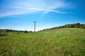 Meadow and power line Royalty Free Stock Photo