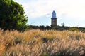 Meadow of Purple Grasses with Lighthouse, Western Australia Royalty Free Stock Photo