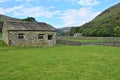 Meadows, Barns and Drystone Walls in Upper Swaledale, Yorkshire Dales, North Yorkshire, England, UK Royalty Free Stock Photo