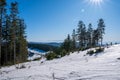 Meadows at the end of winter with snow and mountains in the background, beskydy czech Royalty Free Stock Photo