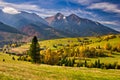 Meadows over Zdiar village under Belianske Tatras mountains during autumn Royalty Free Stock Photo