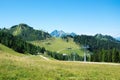 Mountain panorama with meadows and cable car in Austrian Alps. Royalty Free Stock Photo