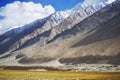 Meadows and snow mountain range Ladakh ,India Royalty Free Stock Photo