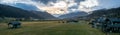 Meadows in the valley and sunset behind the mountains in Austria Royalty Free Stock Photo