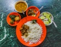 Meal in Bangladesh - Rice, Alo vorta, dhal, Shim borta and chicken cur