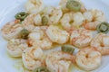 Meal Cooked prawns with pepper on plate in softfocus