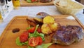 A meal in Croatia presented on a wooden board