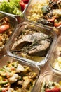 Meal healthy ration for the day in transparent glass bowl. A set of dishes in containers.