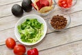 Fresh chopped and prepared ingredients for making homemade tacos and nachos for delicious tasty family dinner Royalty Free Stock Photo