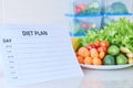 A meal plan for a week on a white table among set of plastic containers for food and food. Proper nutrition during the week Royalty Free Stock Photo