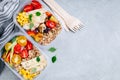 Meal prep l containers with quinoa, grilled and fresh vegetables and chicken