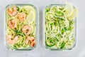 Meal prep lunch box containers Spiralized zucchini noodles pasta with shrimps and cheese