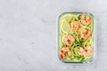 Meal prep lunch box containers Spiralized zucchini noodles pasta with shrimps