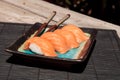 A meal of salmon sushi on white rice Royalty Free Stock Photo