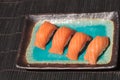 A meal of salmon sushi on white rice Royalty Free Stock Photo