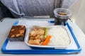 Meal serve on airplane with bakery and soft drink Royalty Free Stock Photo