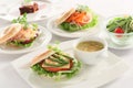 Meal table of hamburger with shrimp, salmon, chicken, vegetables Royalty Free Stock Photo