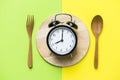 Meal time with alarm clock Royalty Free Stock Photo