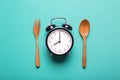 Meal time with alarm clock Royalty Free Stock Photo