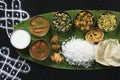 meals served on banana leaf, traditional south Indian cuisine Royalty Free Stock Photo